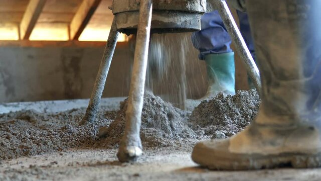 Concrete pump close up details. Sand and cement floor screed. Close up concrete pump. Sand and cement floor screed