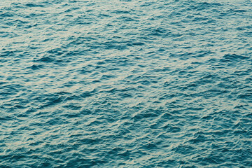 surface of the sea with small wave in sunlight
