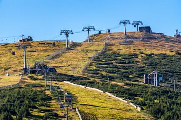 Ski lift chairs and cableways in resort Jasna in Low Tatras mountains, Slovakia