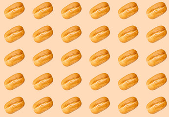 Pattern with a baked loaf on a beige background. Baguette.