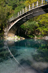 Vertical image of a old bridge in north greece near Papingo