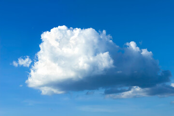 Naklejka na ściany i meble World Environment Day concept: Blue sky with white clouds