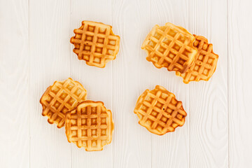 belgian waffles on wooden background top view mockup