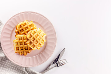 Traditional belgian waffles on white table background top view mockup