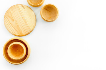 Making wooden dishes. Village table with wooden cutlery set rustic background top view mockup