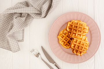 Traditional belgian waffles on white wooden table background top view mockup