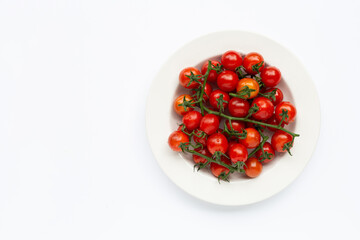 Fresh tomatoes, whole and half cut isolated on white background.