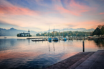 Fototapeta premium pictorial water castle, called Schloss Orth, sunset at Traunsee lake, Salzkammergut austria