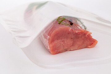 raw pork tenderloin in bag ready for sous vide