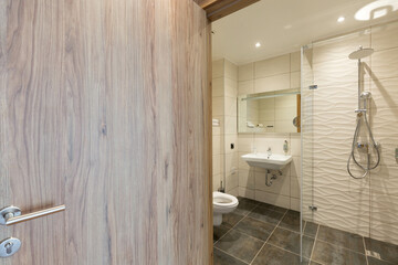 Interior of a hotel bathroom interior with shower cabin