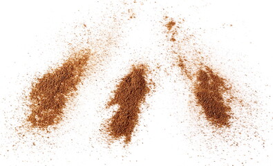 Cinnamon powder piles set isolated on white background, top view