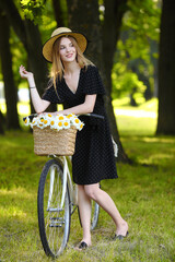 Vintage beautiful fashion girl with bicycle in the morning