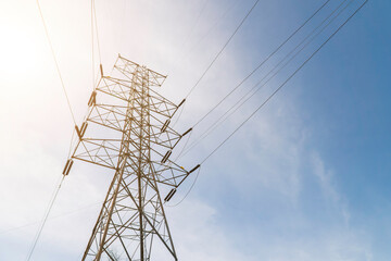 Electric high voltage tower with blue sky and cloud. Electric pole with copy space.