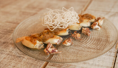 Grilled squid with caramelized onion and special sauce