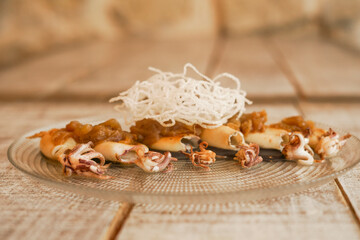 Grilled squid with caramelized onion and special sauce