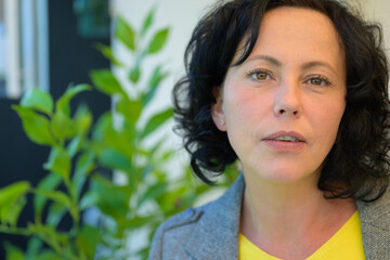 Candid portrait of a pensive Hispanic woman