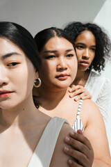 Face portraits with women of different ethnicities.