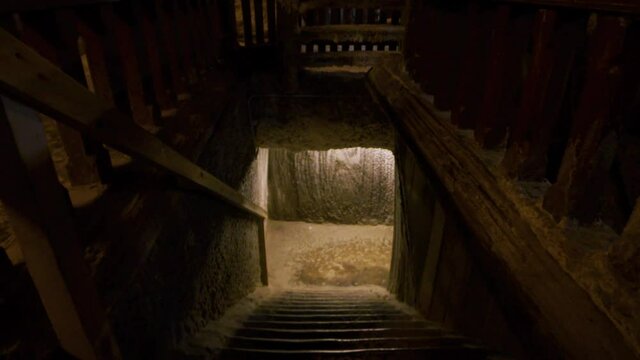 Slow motion shot of creepy basement stairs. Ghost story, horror, thriller setup