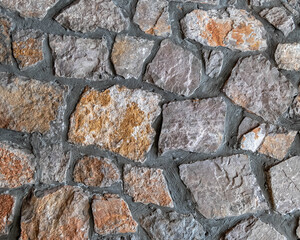 colorful stone wall closeup, natural textured background