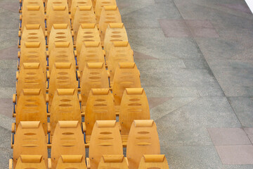 Row of yellow chair in the waiting room railway station, Russia