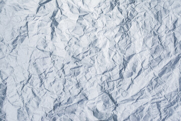 crumpled sheet of white paper