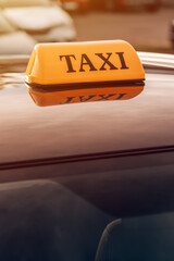 Taxi sign on cab car roof