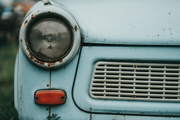 Old rarity cars in a landfill. Scrap metal or vintage.