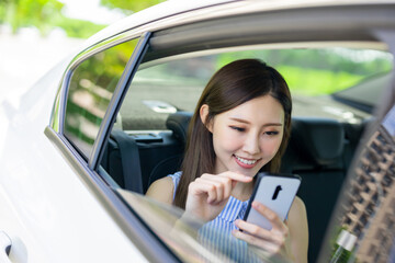 businesswoman use phone in car