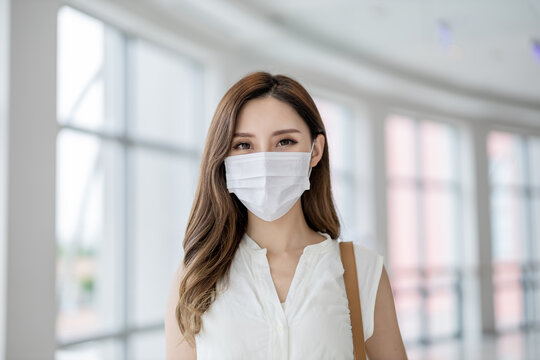 Asian Woman With Facial Mask