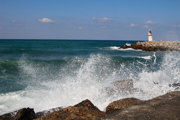 Agva lighthouse. Waves hitting the rocks