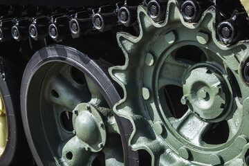 rollers and wheels on the tracks of the suspension of the battle tank