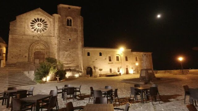 Empty square of the Dome of Altomonte, in the evening. Italy, Cosenza. Panning right.