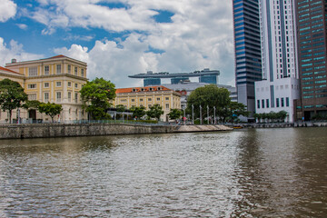 Singapore city center seen from the river that runs through it and bears the same name. Asia. Singapore. - 377317325