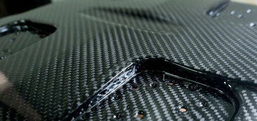 Beautiful carbon fiber product part by paint clear coat on top