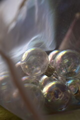 Blown glass bauble hanging/Christmas balls in a mesh organza bag.