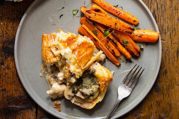 Chicken and mushroom pie with roast carrots