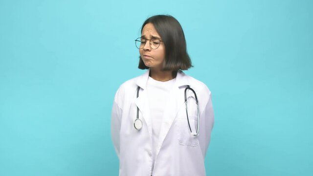 Young doctor indian woman confused, feels doubtful and unsure