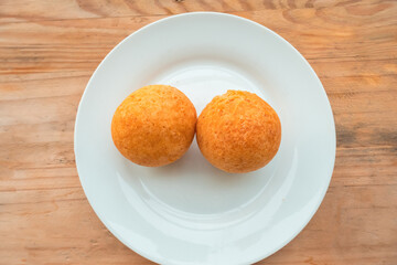 Traditional Colombian bunuelos (Deep Fried Cheese Bread) on christmas