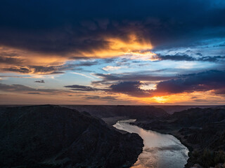 Beautiful sunset on the river. Ili River in spring. Kazakhstan. Almaty Region