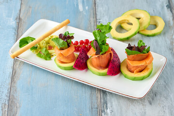 Smoked Salmon with avocado selective focus