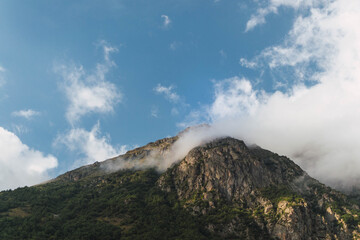 Mountain with clouds on the top