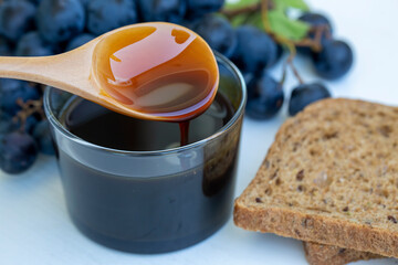 Grape molasses and fresh organic grapes