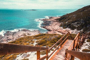 Steps leading to an empty beach, white sand and turquoise water, Esperance Western Australia