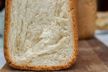 Freshly baked bread was baked at home in a bread maker