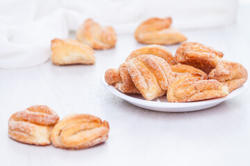 Tasty baked butter sugar cookies on white background.