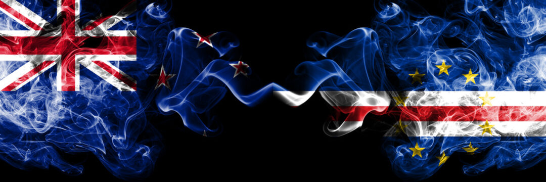 New Zealand vs Cape Verde smoky mystic flags placed side by side. Thick colored silky abstract smoke flags