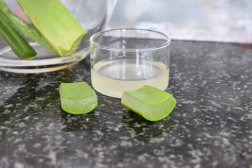 fresh and homemade aloe vera gel with fresh aloe leaves for skin care and hair care multipurpose gel