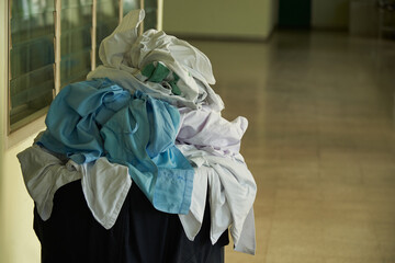 Patients clothes and linens waiting for laundry