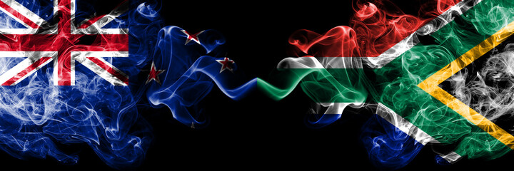 New Zealand vs South Africa, African smoky mystic flags placed side by side. Thick colored silky abstract smoke flags