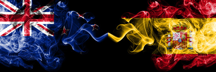 New Zealand vs Spain, Spanish smoky mystic flags placed side by side. Thick colored silky abstract smoke flags